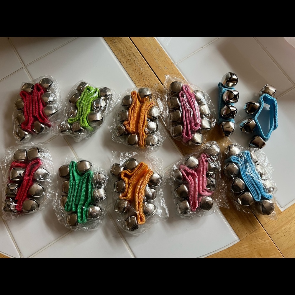 Hand held/ wrist band jingle bells